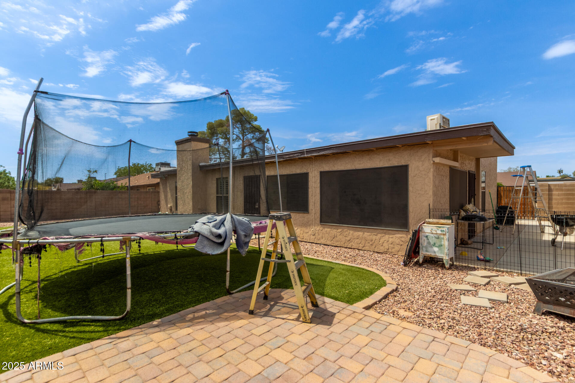317 East Harwell Road Gilbert, AZ 85234 - Photo 29 of 29 a view of a house with backyard sitting area and swimming pool