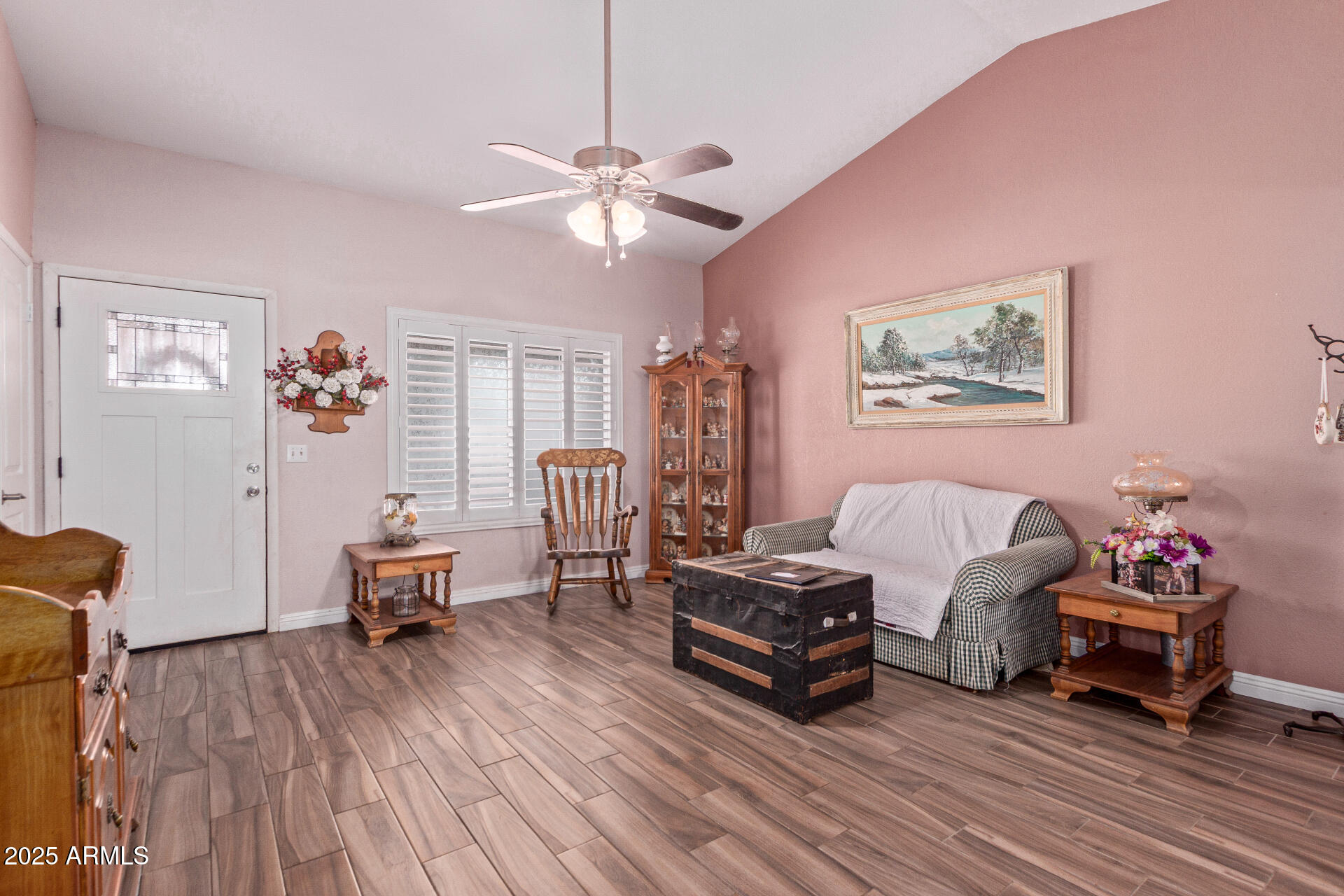 317 East Harwell Road Gilbert, AZ 85234 - Photo 5 of 29 a living room with furniture and a wooden floor