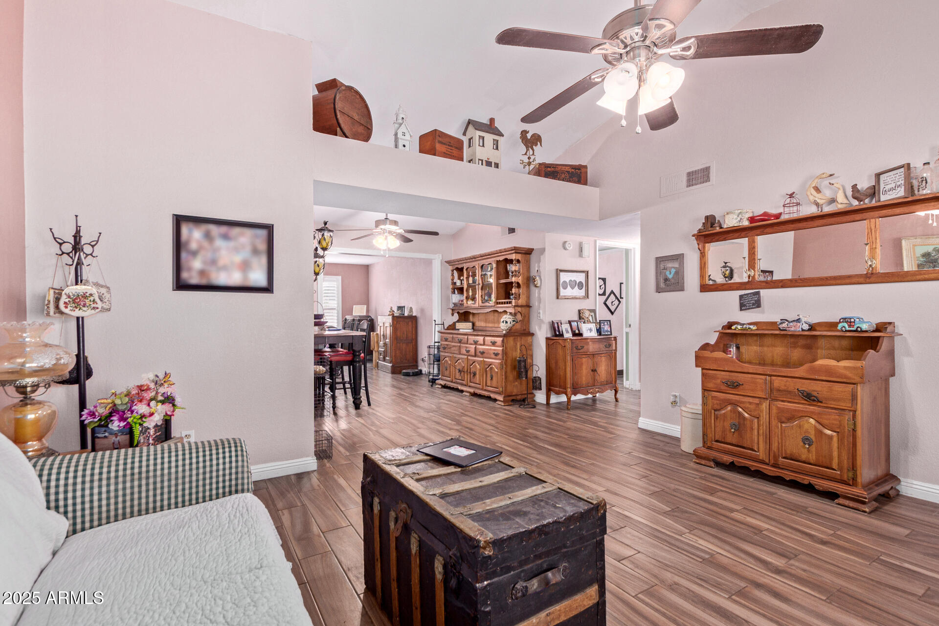 317 East Harwell Road Gilbert, AZ 85234 - Photo 6 of 29 a living room with furniture and wooden floor