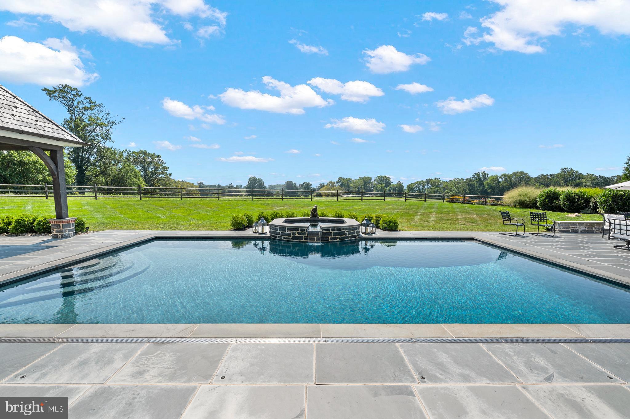 4 Ayrshire Drive Villanova, PA 19085 - Photo 10 of 96 gunite pool & spa with overflow spillway