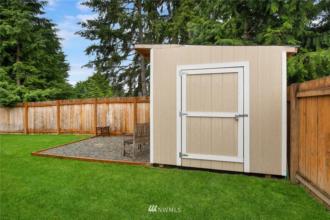 4010 Northeast 19th Street Renton, WA 98056 - Photo 24 of 25 a view of backyard with cabin