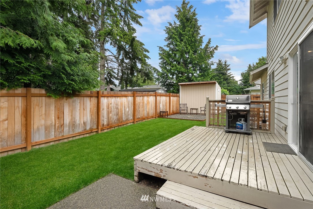 4010 Northeast 19th Street Renton, WA 98056 - Photo 25 of 25 a view of a backyard with wooden floor