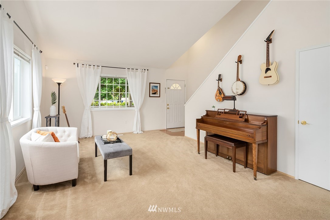 4010 Northeast 19th Street Renton, WA 98056 - Photo 4 of 25 a living room with furniture and a window