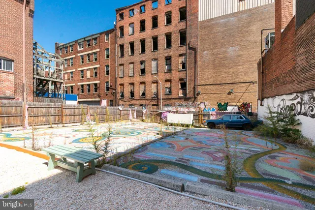 a sign that is on the side of the building