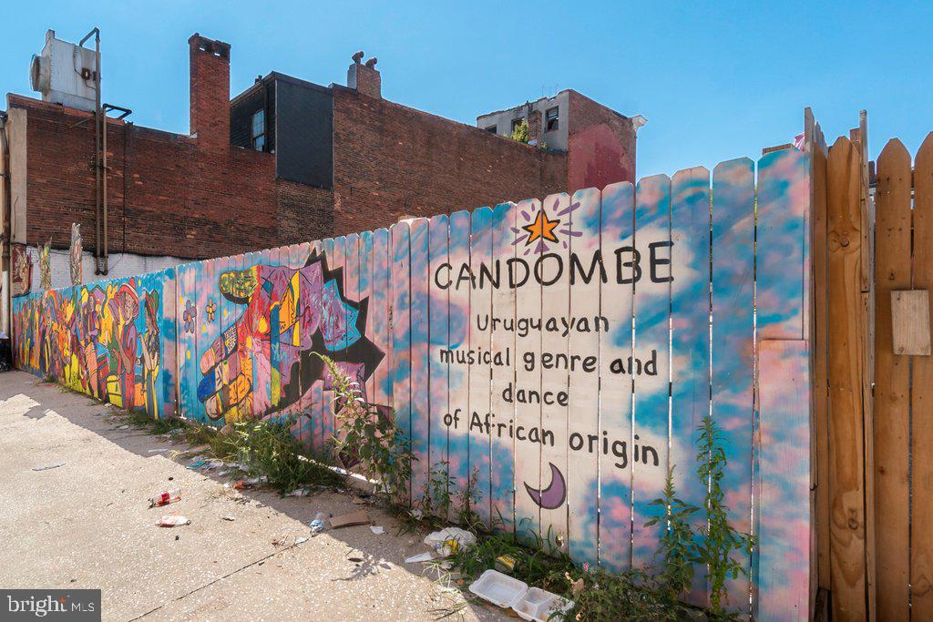 319 North Paca Street Baltimore, MD 21201 - Photo 5 of 9 a sign that is on the side of the building