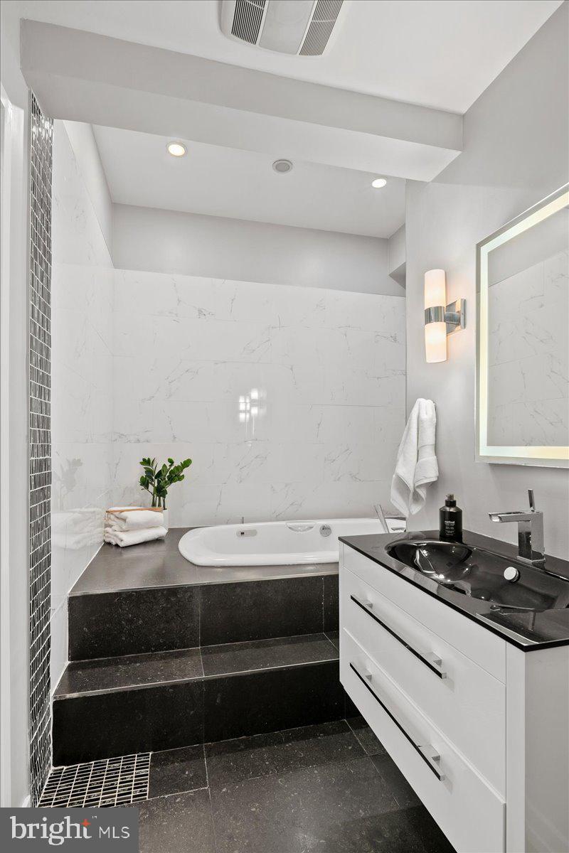 4324 Rosedale Avenue Bethesda, MD 20814 - Photo 39 of 73 Sleek modern bathroom oasis.