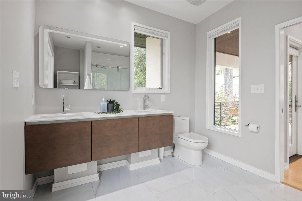 4324 Rosedale Avenue Bethesda, MD 20814 - Photo 58 of 73 Modern elegance in a serene bathroom.