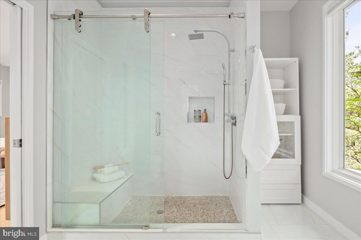 4324 Rosedale Avenue Bethesda, MD 20814 - Photo 60 of 73 Sleek modern shower with natural light.