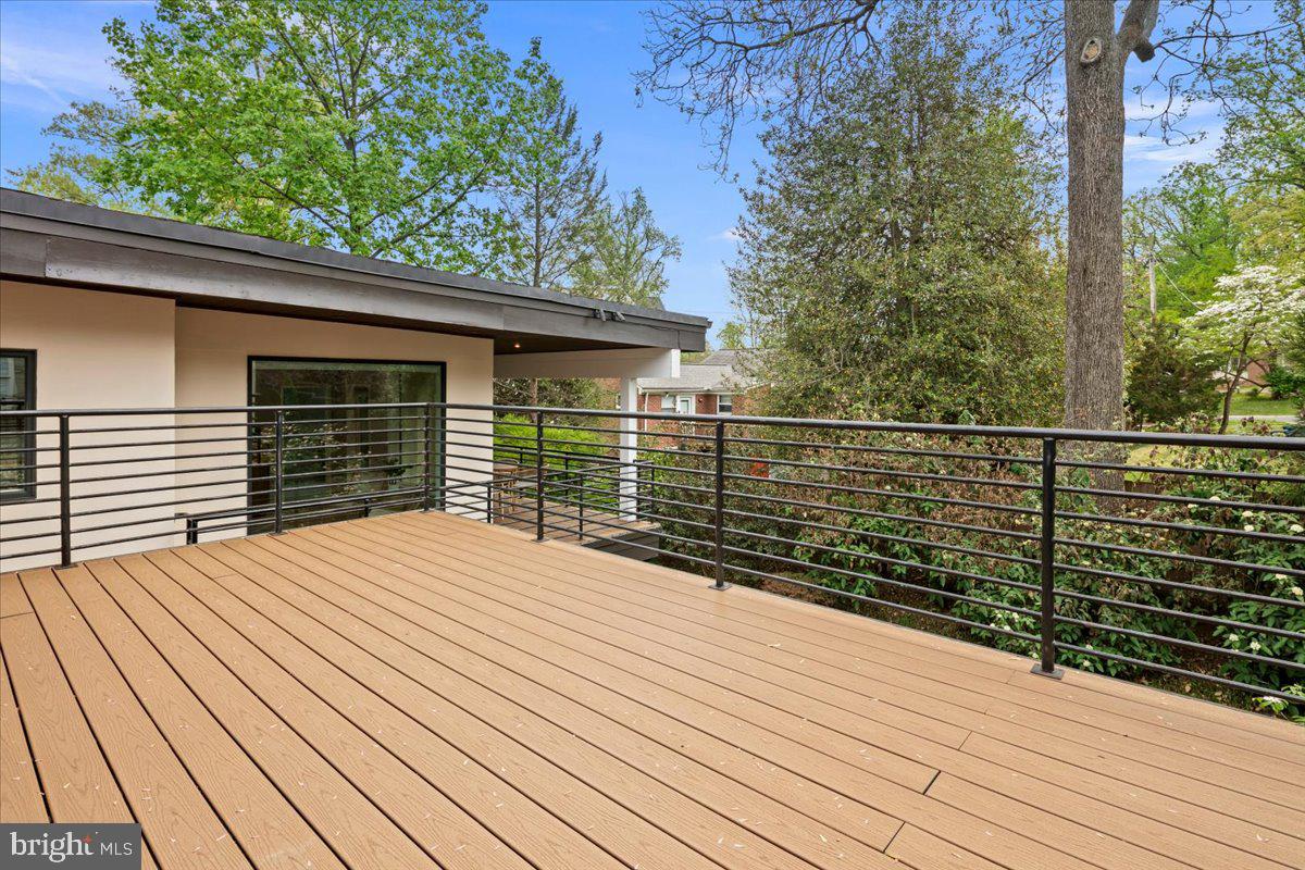 4324 Rosedale Avenue Bethesda, MD 20814 - Photo 70 of 73 Spacious deck with lush greenery views.
