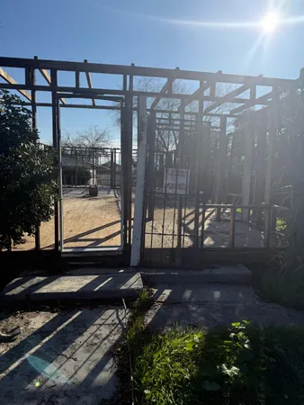 a view of a backyard with a garden