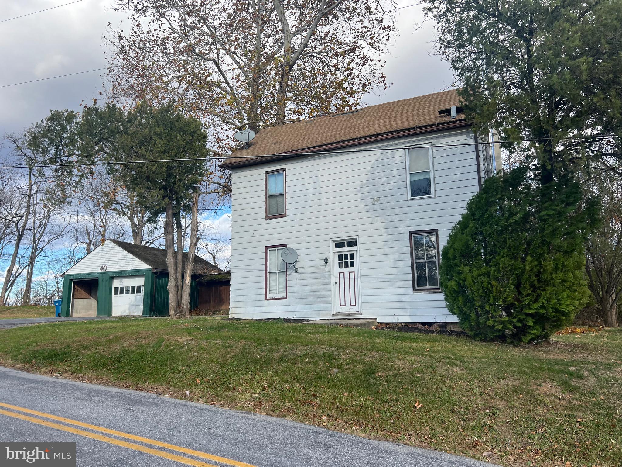 40 North Fileys Road Dillsburg, PA 17019 - Photo 1 of 25 a front view of house with yard and garage