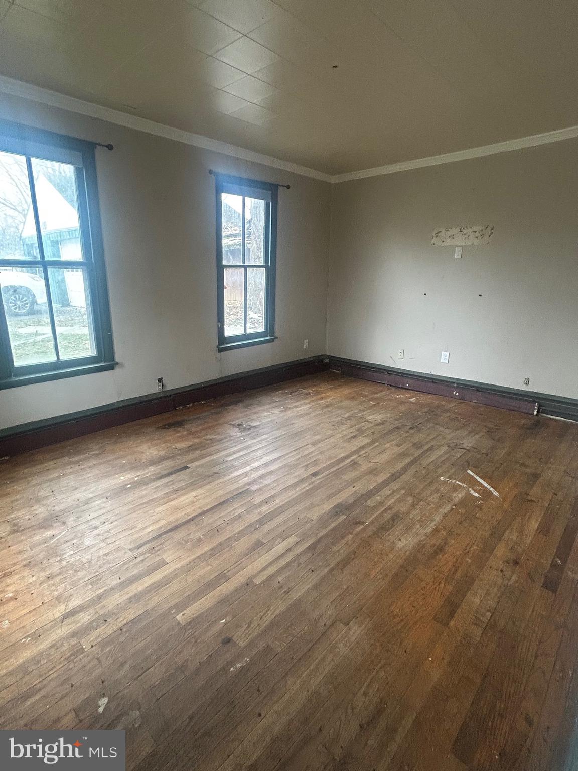 40 North Fileys Road Dillsburg, PA 17019 - Photo 11 of 25 an empty room with wooden floor and windows