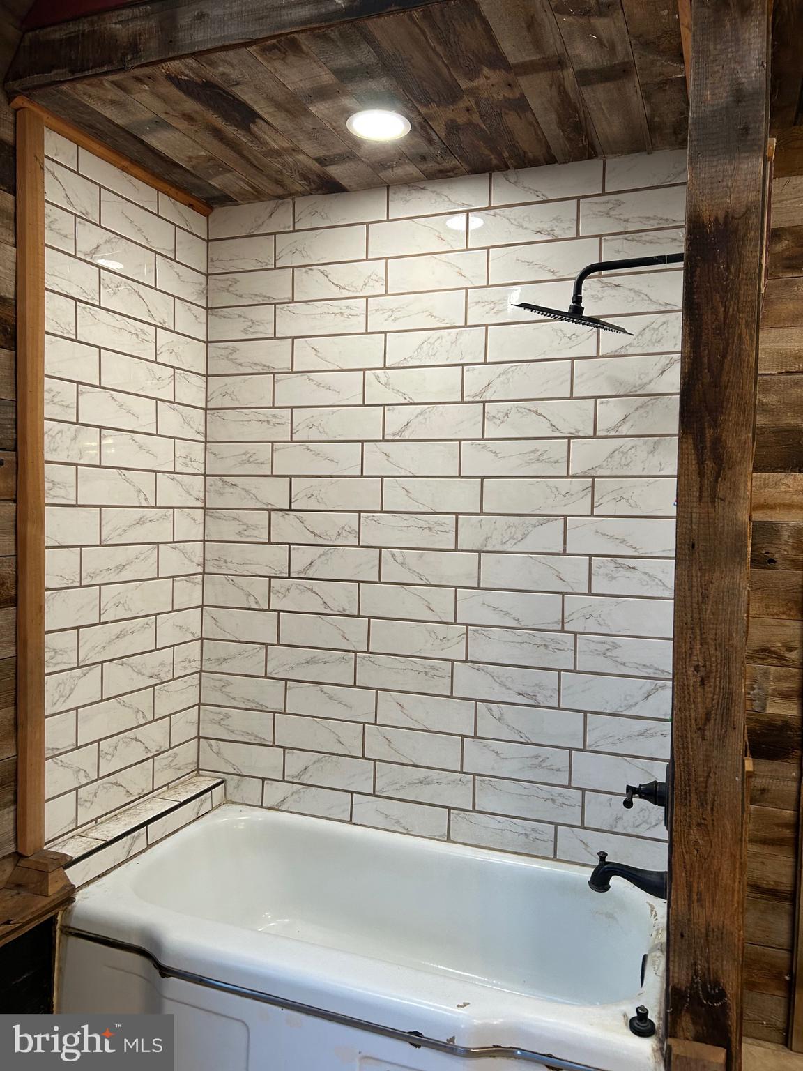 40 North Fileys Road Dillsburg, PA 17019 - Photo 12 of 25 a bathroom with a bathtub and shower