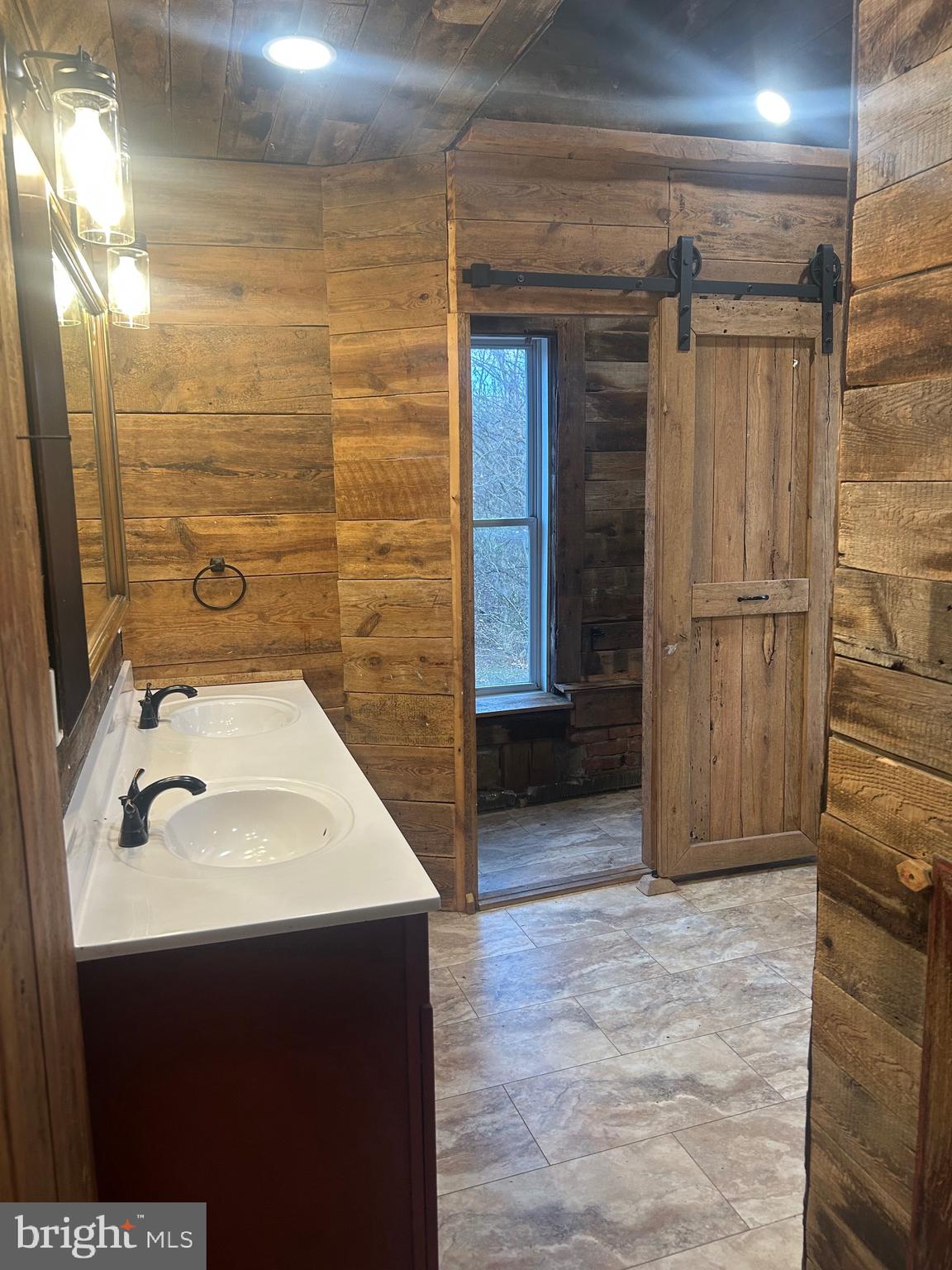 40 North Fileys Road Dillsburg, PA 17019 - Photo 14 of 25 a bathroom with a sink and a mirror