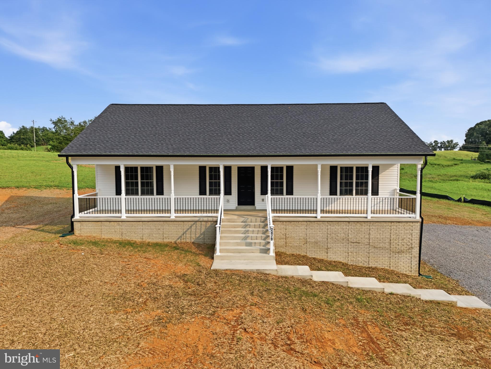 2974 Novum Road Reva, VA 22735 - Photo 1 of 44 a front view of a house with a yard