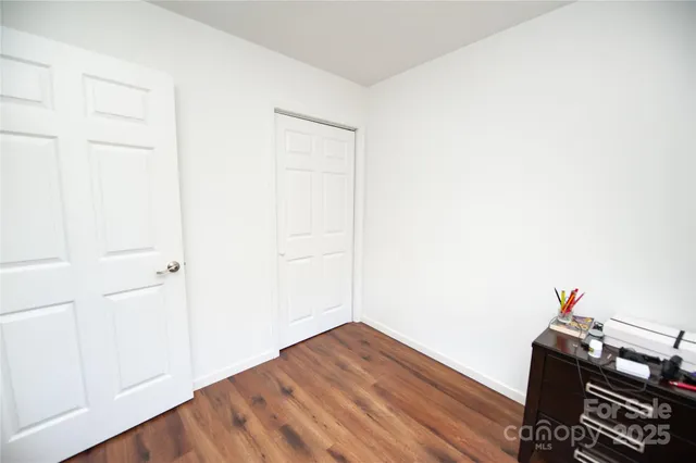 a bathroom with a sink a toilet a shower and a mirror