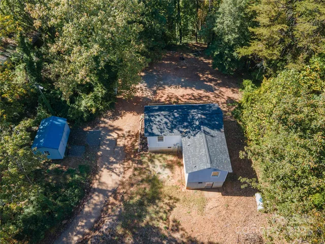 a view of a back yard of the house