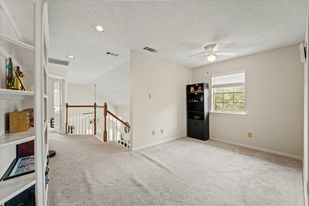 9420 Blue Jay Way Irving, TX 75063 - Photo 15 of 27 a view of an empty room