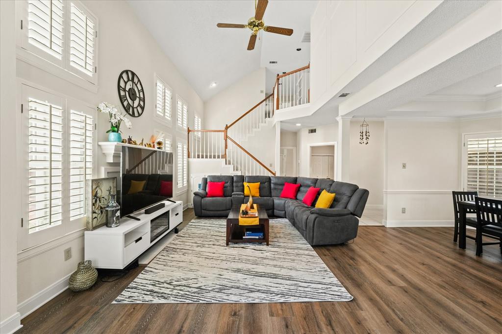 9420 Blue Jay Way Irving, TX 75063 - Photo 7 of 27 a living room with furniture and a flat screen tv