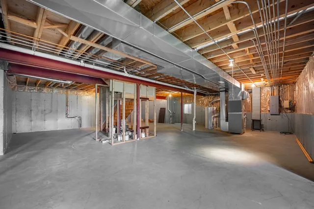 a view of a room with wooden walls