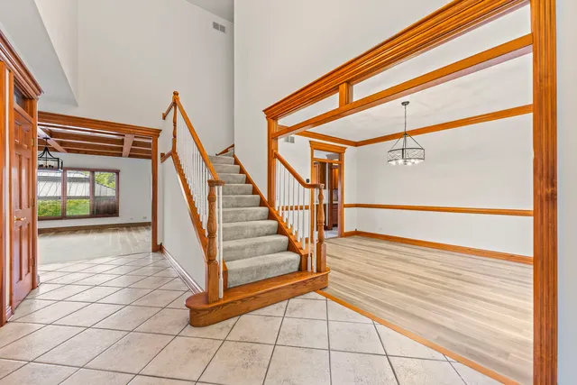 a view of entryway with wooden floor