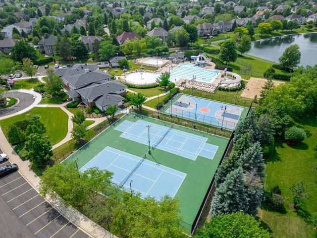 an aerial view of a house with a garden