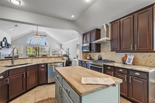 a view of a kitchen and dining room