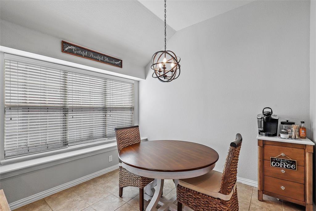 7067 Nantucket Way Grand Prairie, TX 75054 - Photo 17 of 40 a view of a room with a table and chairs