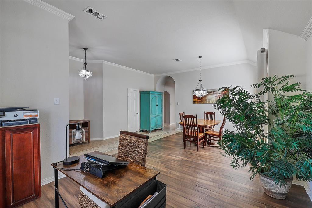 7067 Nantucket Way Grand Prairie, TX 75054 - Photo 18 of 40 a living room with furniture and a wooden floor