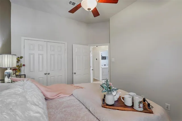 a bathroom with a sink a mirror a bathtub and a window