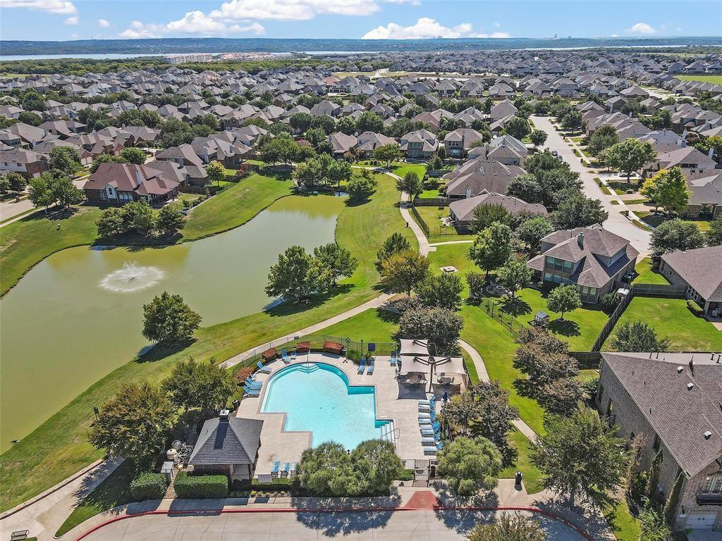 7067 Nantucket Way Grand Prairie, TX 75054 - Photo 33 of 40 an aerial view of a house with a lake view
