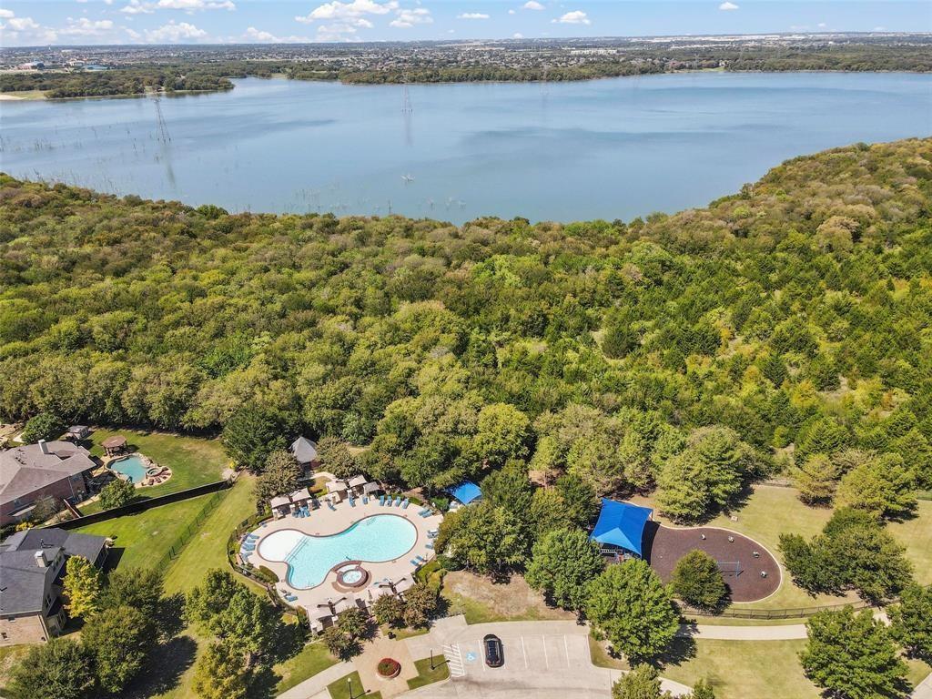 7067 Nantucket Way Grand Prairie, TX 75054 - Photo 34 of 40 a view of a lake with outdoor space