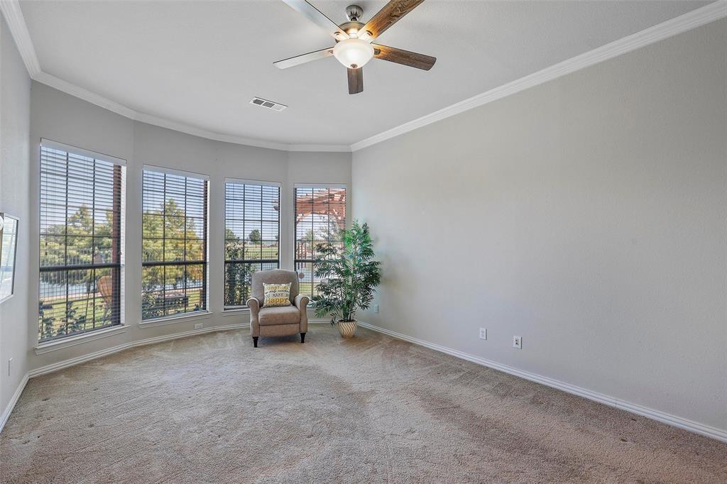 7067 Nantucket Way Grand Prairie, TX 75054 - Photo 8 of 40 a living room with furniture and large windows