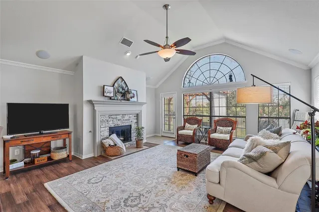 a kitchen with a refrigerator a sink and a stove top oven
