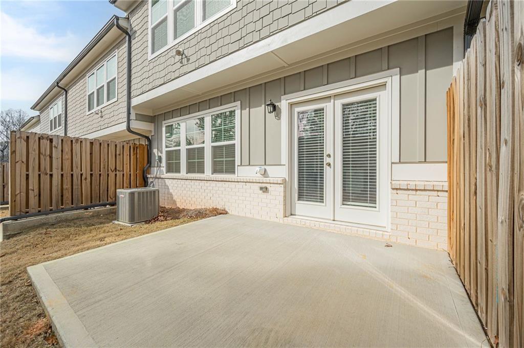 628 Isom Walk Suwanee, GA 30024 - Photo 35 of 39 a view of an entrance of the house