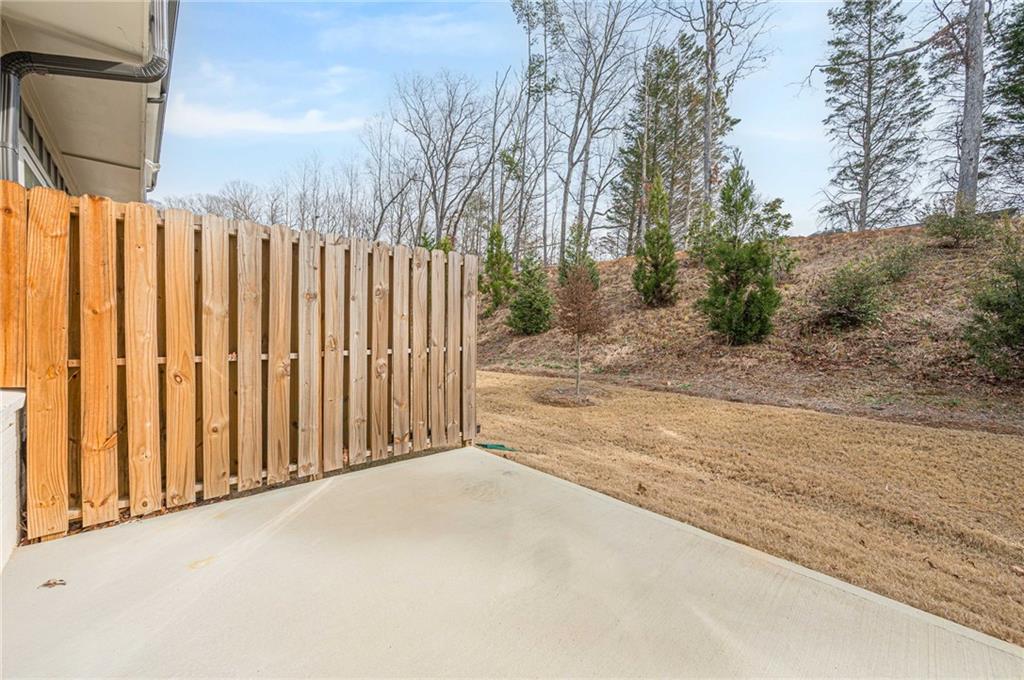 628 Isom Walk Suwanee, GA 30024 - Photo 36 of 39 a view of a backyard of the house