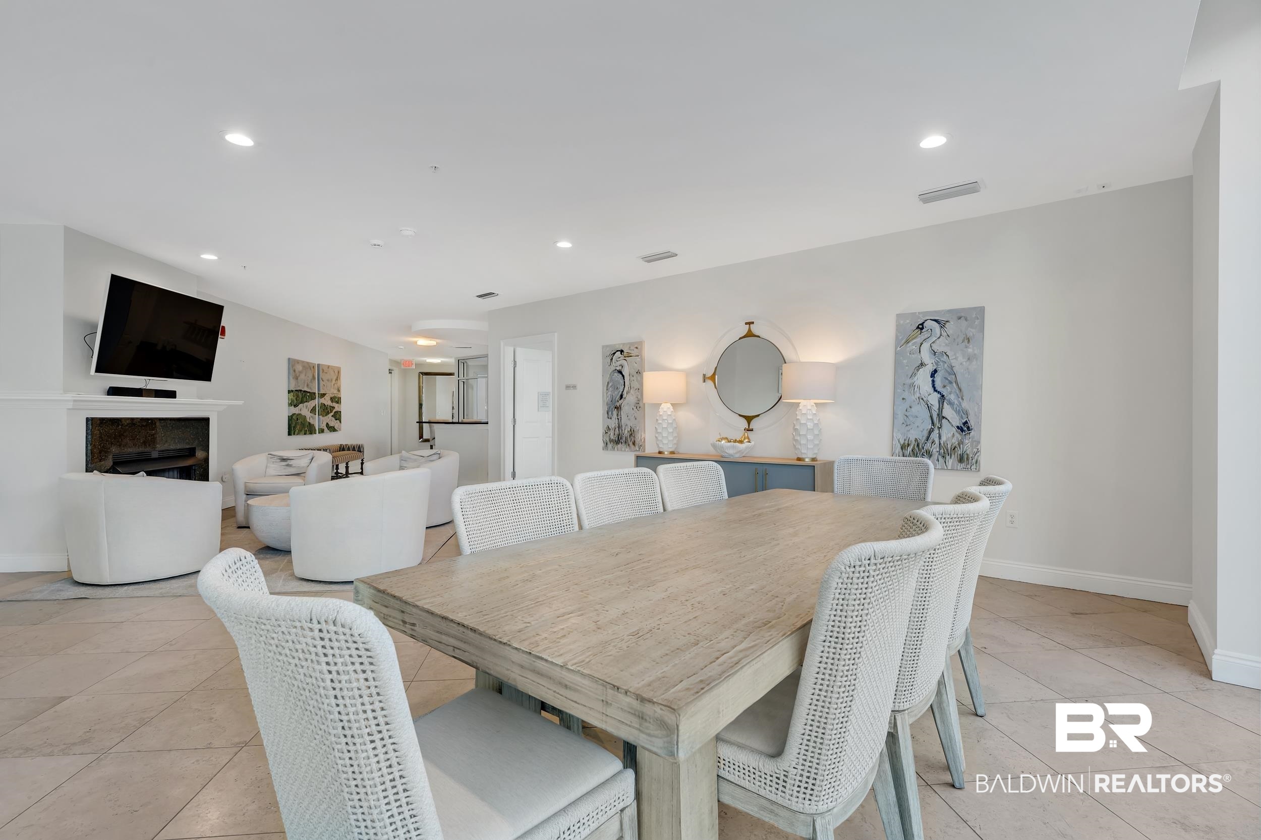 28250 Canal Road, Unit 307 Orange Beach, AL 36561 - Photo 50 of 56 Dining area with light tile patterned floors, recessed lighting, and a fireplace