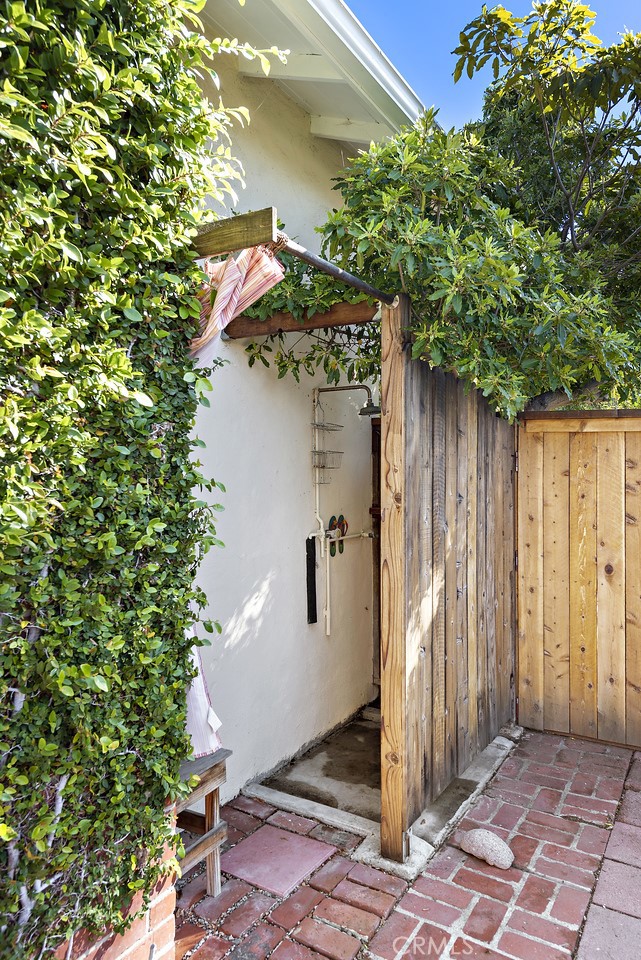 490 Shadow Lane Laguna Beach, CA 92651 - Photo 11 of 18 a front view of a house with a tree