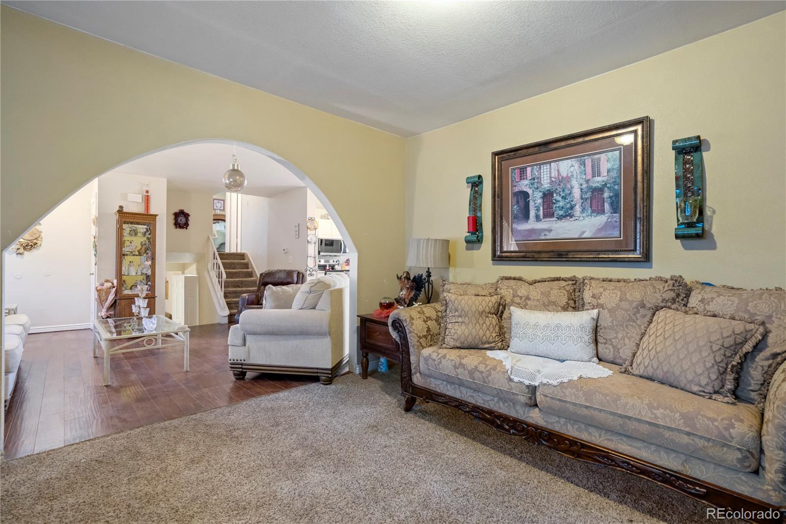 4345 South Chamberlin Colorado Springs Colorado Springs, CO 80906 - Photo 6 of 23 a living room with furniture and a large window