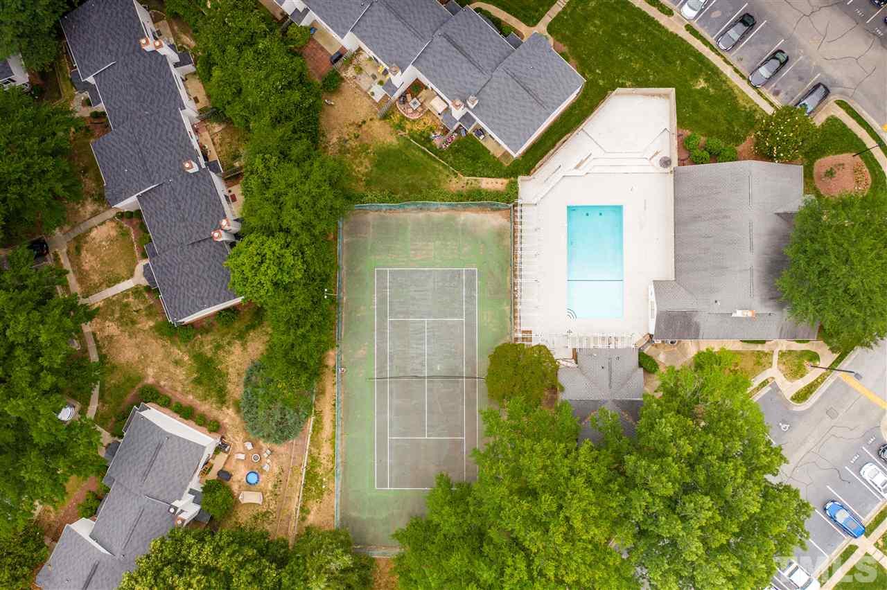 7744 Falcon Rest Circle Raleigh, NC 27615 - Photo 4 of 22 an aerial view of a house with a yard
