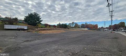 a view of road next to a building