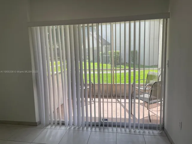 a view of a balcony with a plant