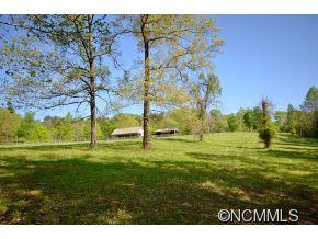 1400 South Wilson Hill Road Mill Spring, NC 28756 - Photo 21 of 24 a view of an outdoor space and a yard