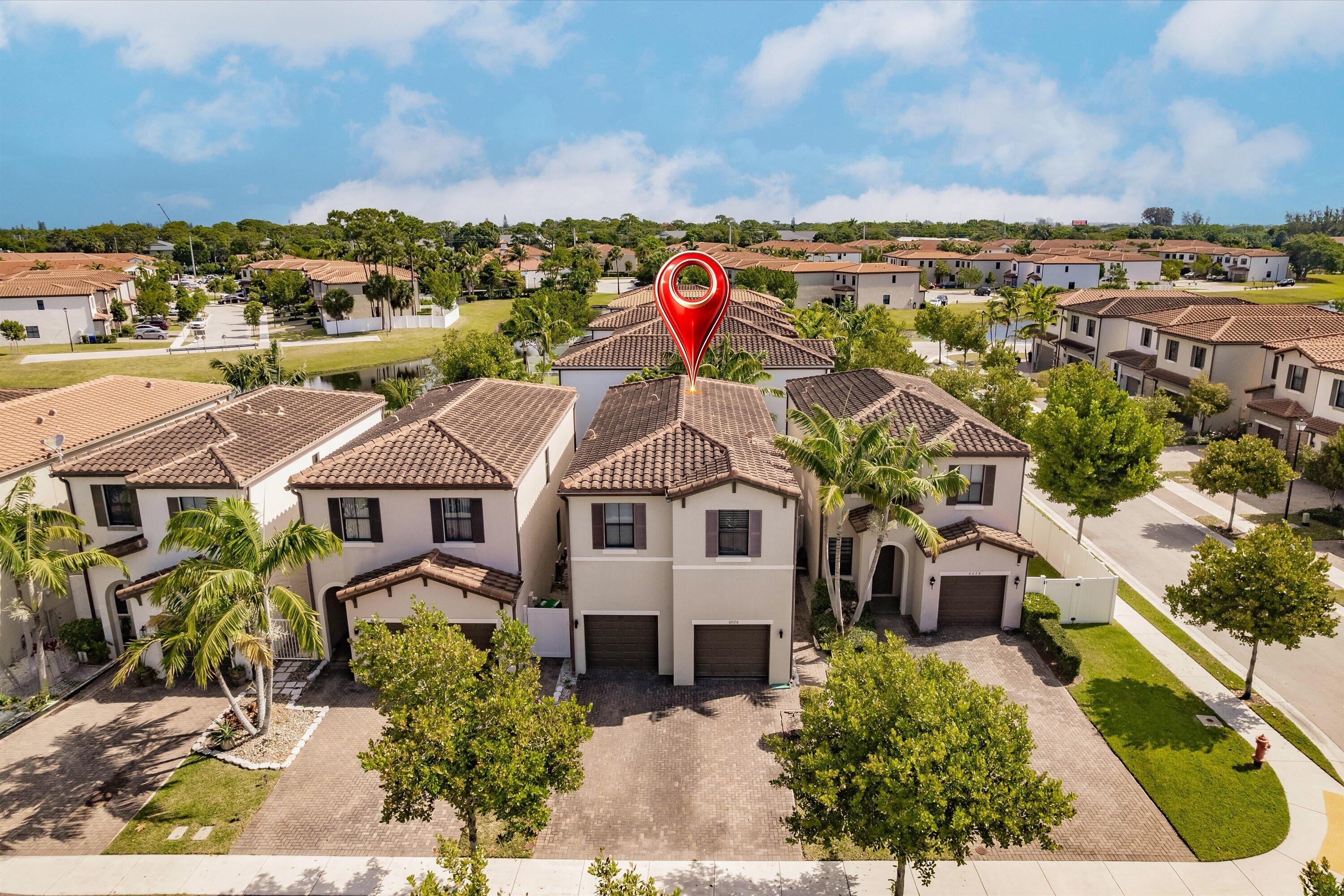 6026 Pine Tree Way, Unit 6026 Riviera Beach, FL 33410 - Photo 28 of 31 25-Aerial Photo 025