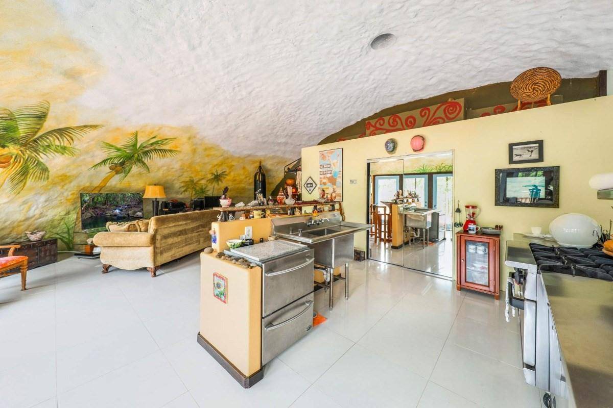 5390 Menehune Road Waimea, HI 96796 - Photo 3 of 22 a view of living room with furniture and flat screen tv