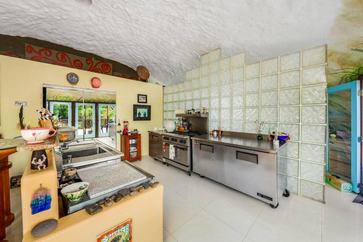 5390 Menehune Road Waimea, HI 96796 - Photo 7 of 22 a view of a kitchen with appliances