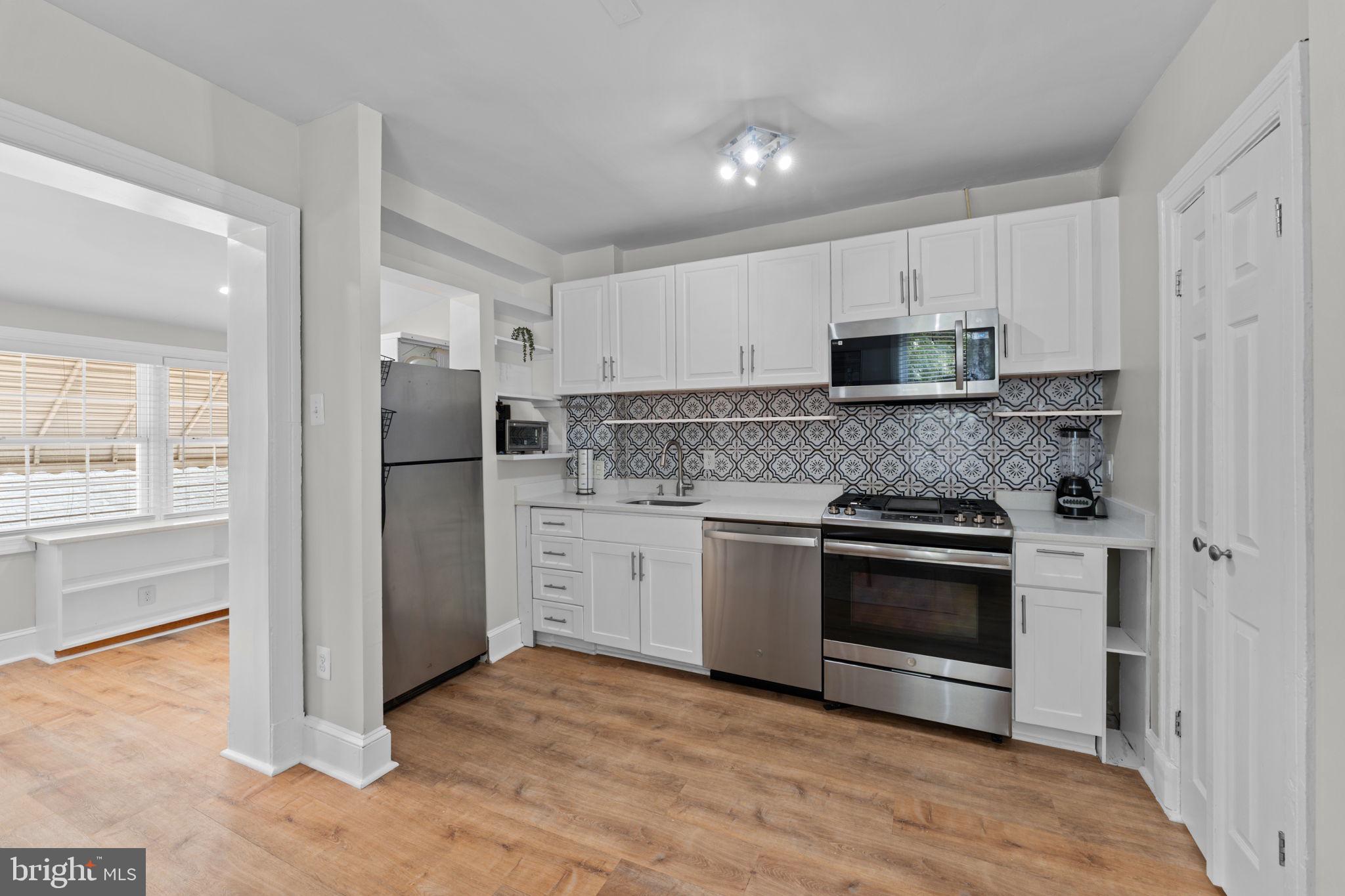 2339 3rd Street Northeast Washington, DC 20002 - Photo 4 of 59 Renovated main level kit. w/SS appliances!