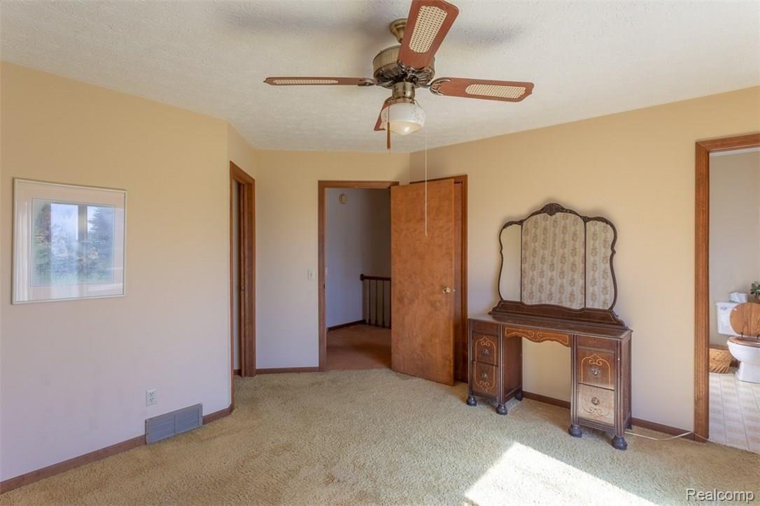 3440 North Hickory Ridge Road Highland, MI 48357 - Photo 20 of 43 MASTER BEDROOM