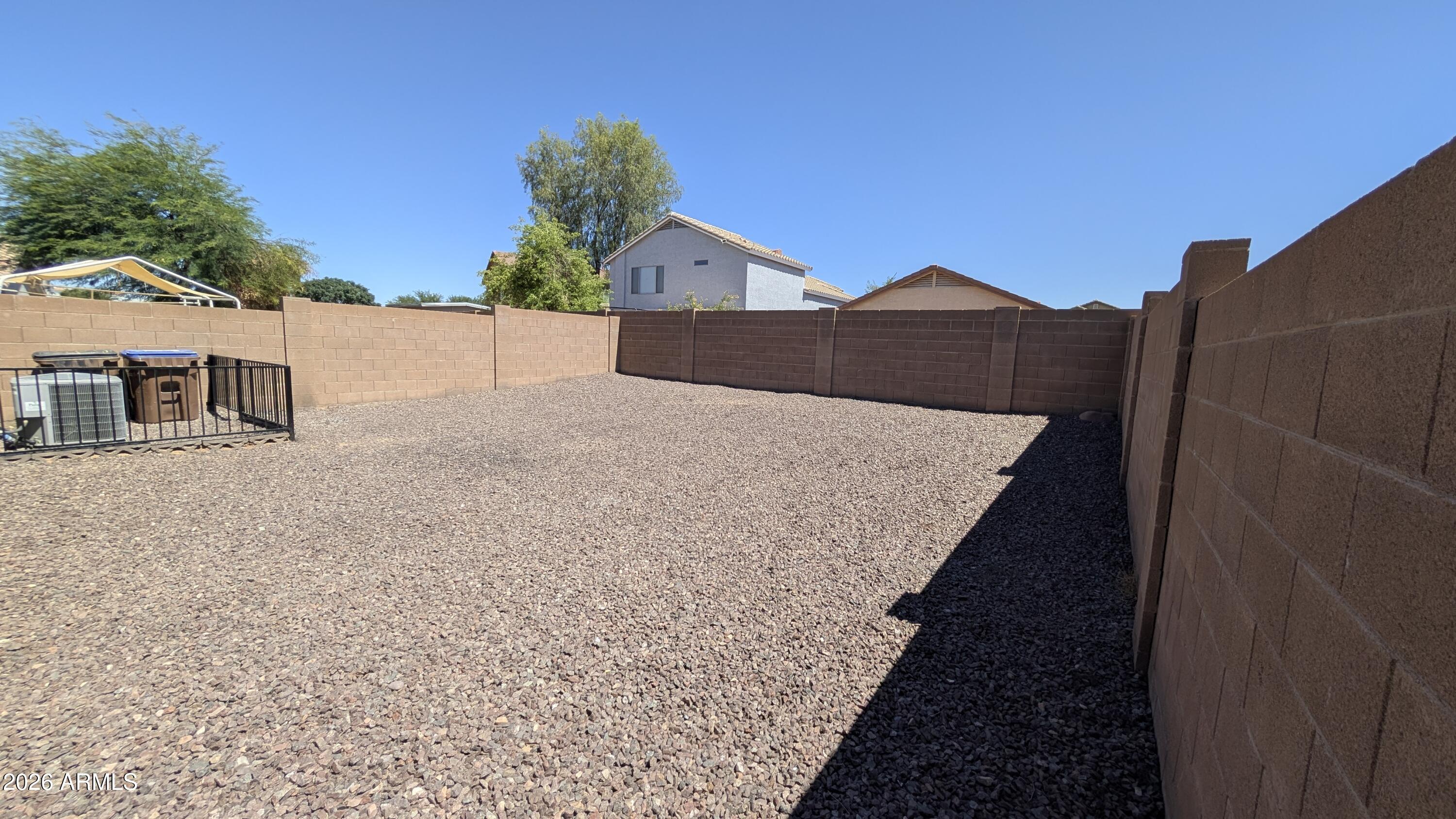 1377 East Pryor Road San Tan Valley, AZ 85140 - Photo 6 of 31 a view of a house with a yard