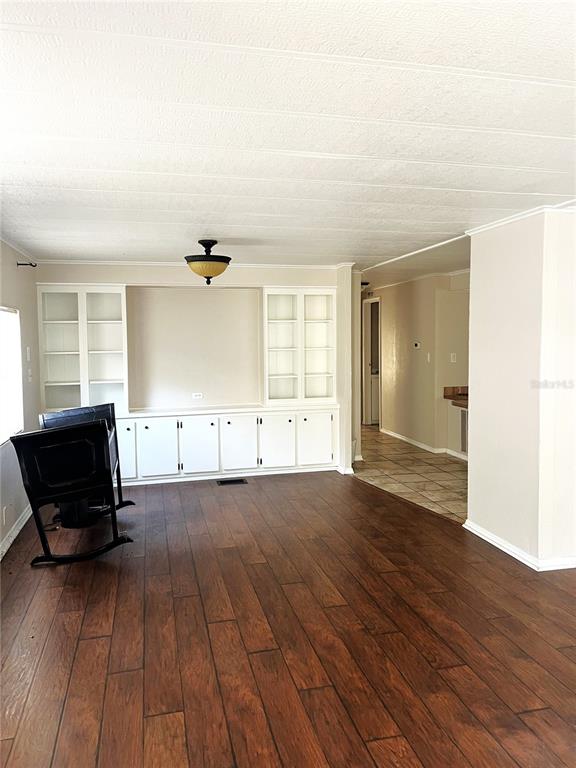 5020 Sydney Road Plant City, FL 33566 - Photo 27 of 33 an empty room with wooden floor and windows